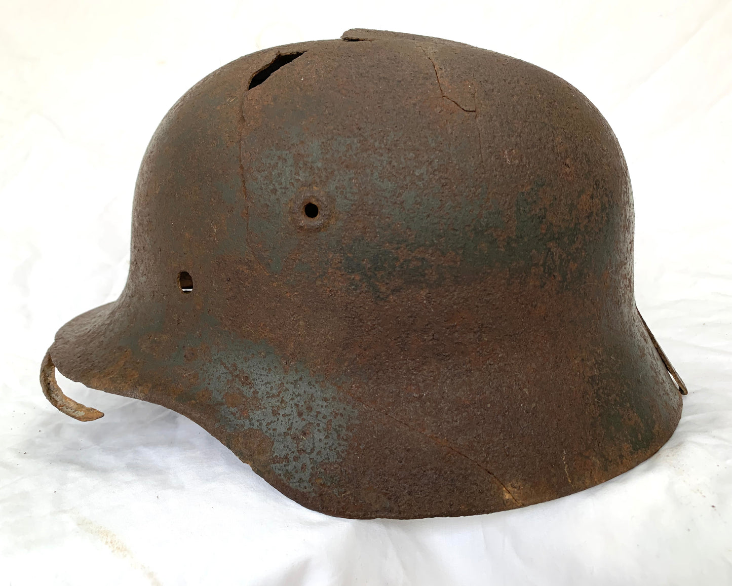 WW2 German M40 SS Battle Damaged Helmet from the Nava Front