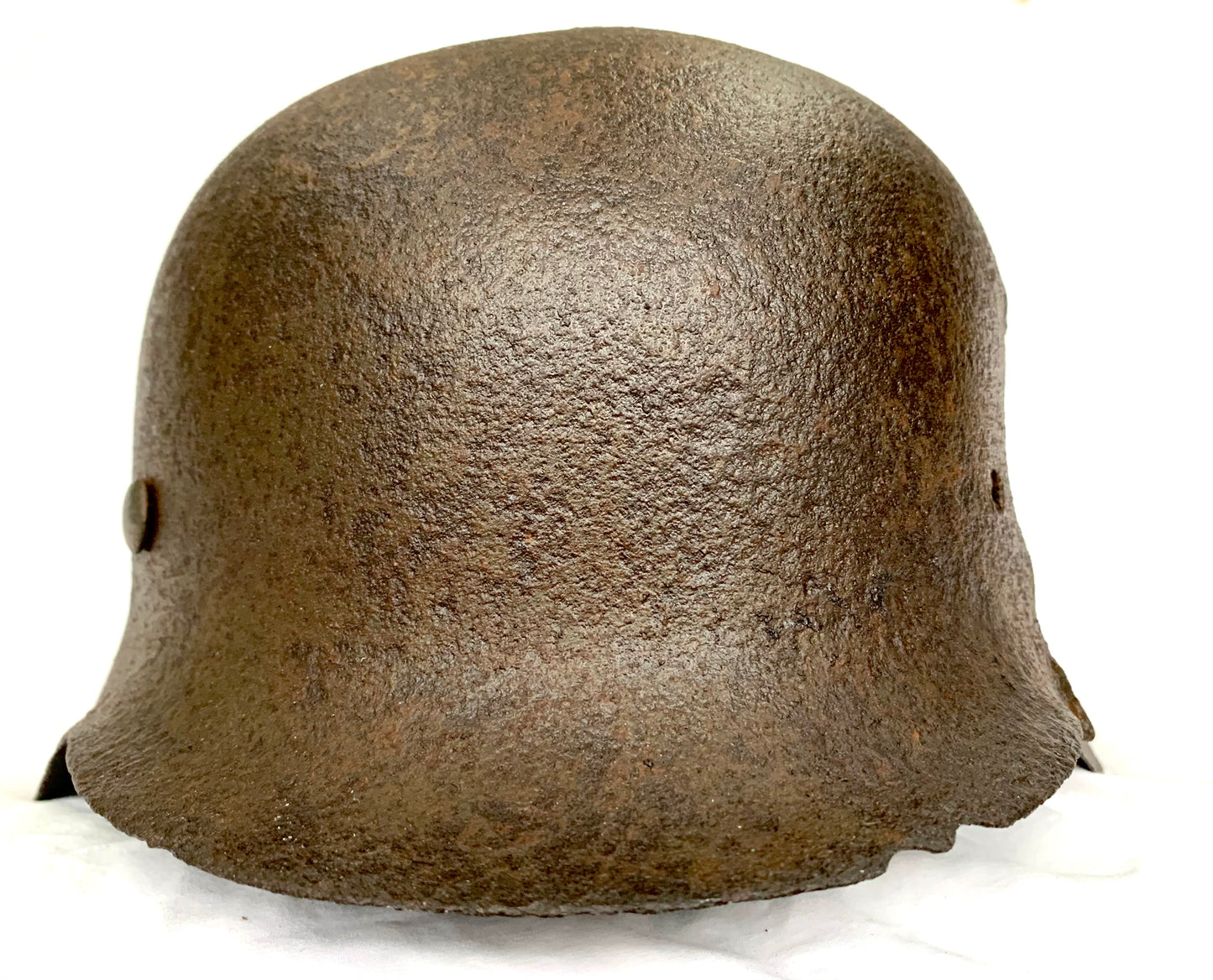 WW2 German M42 Waffen SS Battle Damaged Helmet from the 19 Waffen-Grenadier-Division der SS (lett. Nr. 2) found at Latgalia.
