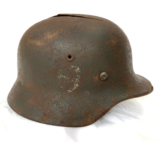 WW2 German M40 SS Battle Damaged Helmet from the Nava Front