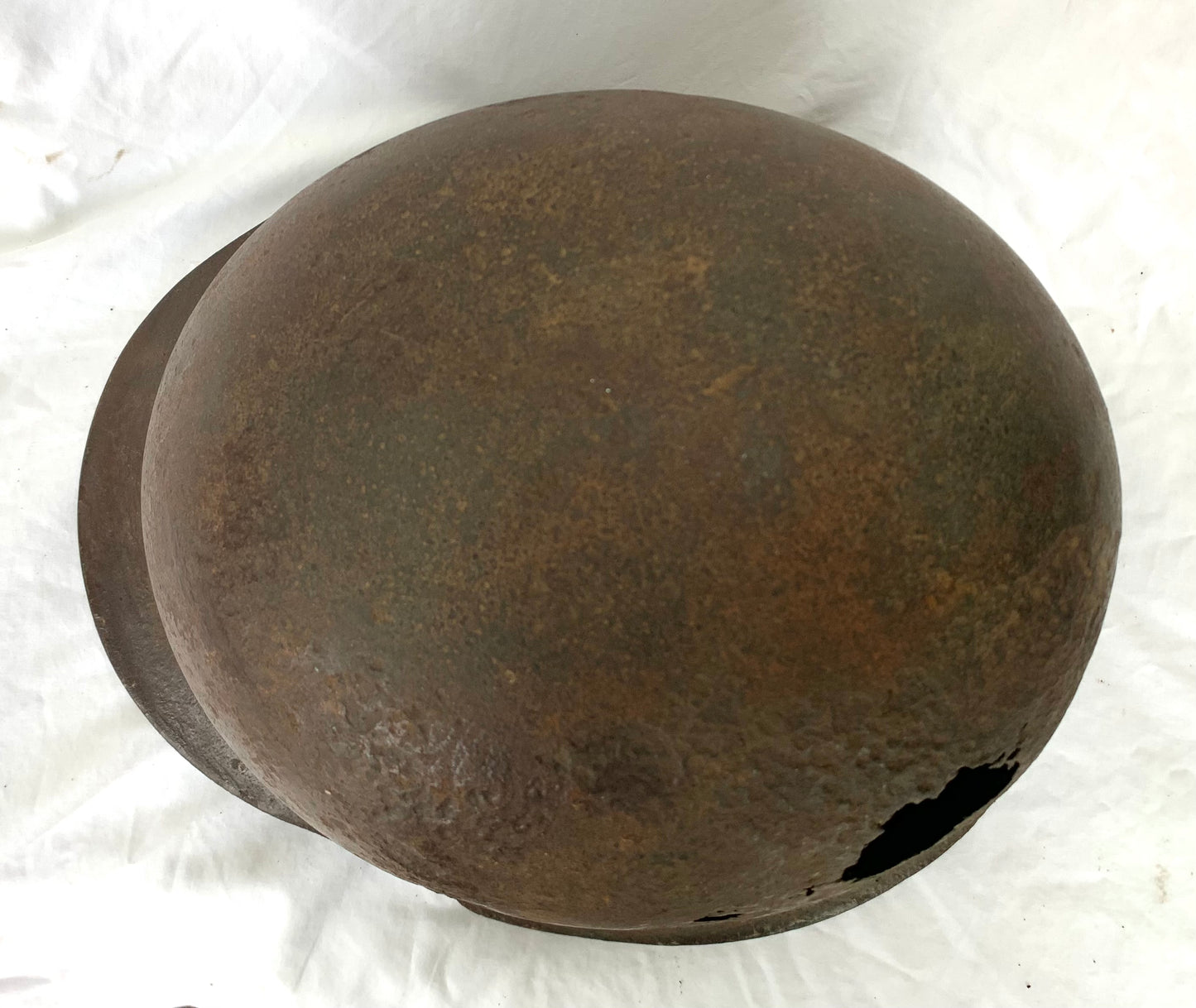 WW2 German M42 single decal Battle Damaged Helmet with Liner recovered from the Eastern Front