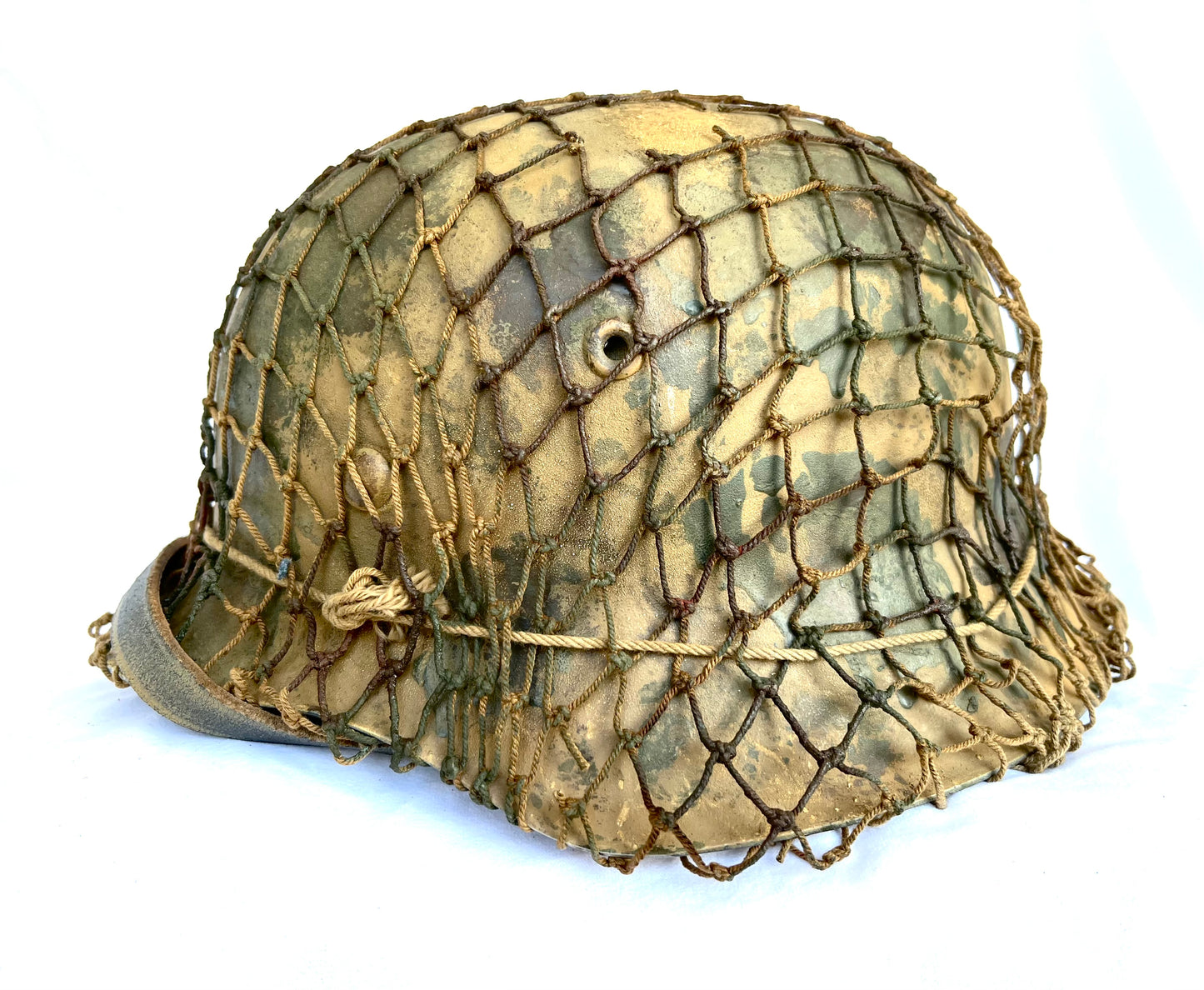 WW2 German M42 Camo Helmet with liner, chinstrap and net.
