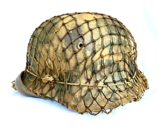 WW2 German M42 Camo Helmet with liner, chinstrap and net.