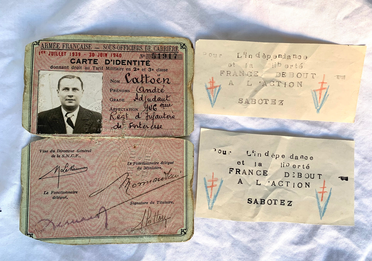 A Stunning FFI/Resistance Grouping to Andre Cattoen including Fighting Knife, coded newspaper, ID Cards, FFI Flag and much more.