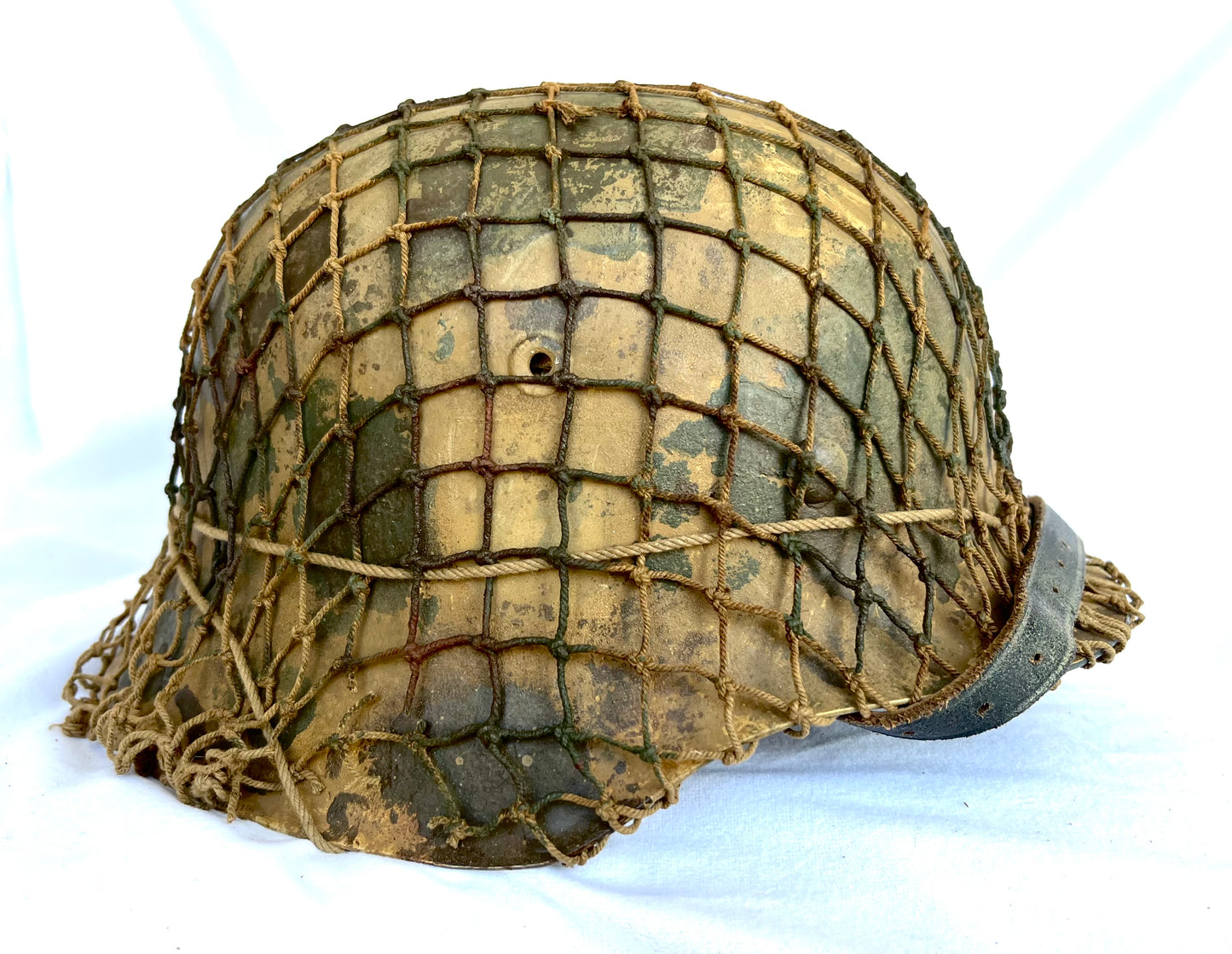 WW2 German M42 Camo Helmet with liner, chinstrap and net.