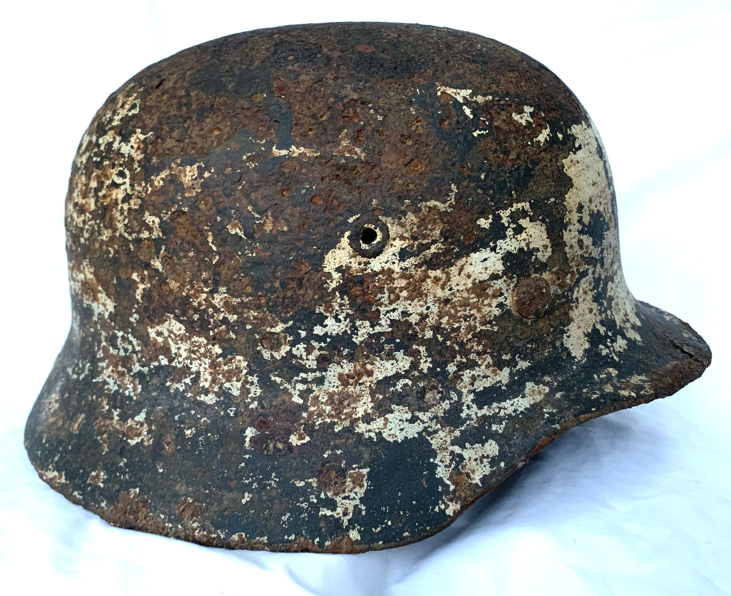 WW2 German M40 Single Decal Winter Camouflage Battle Recovered Helmet with Liner and maker mark.