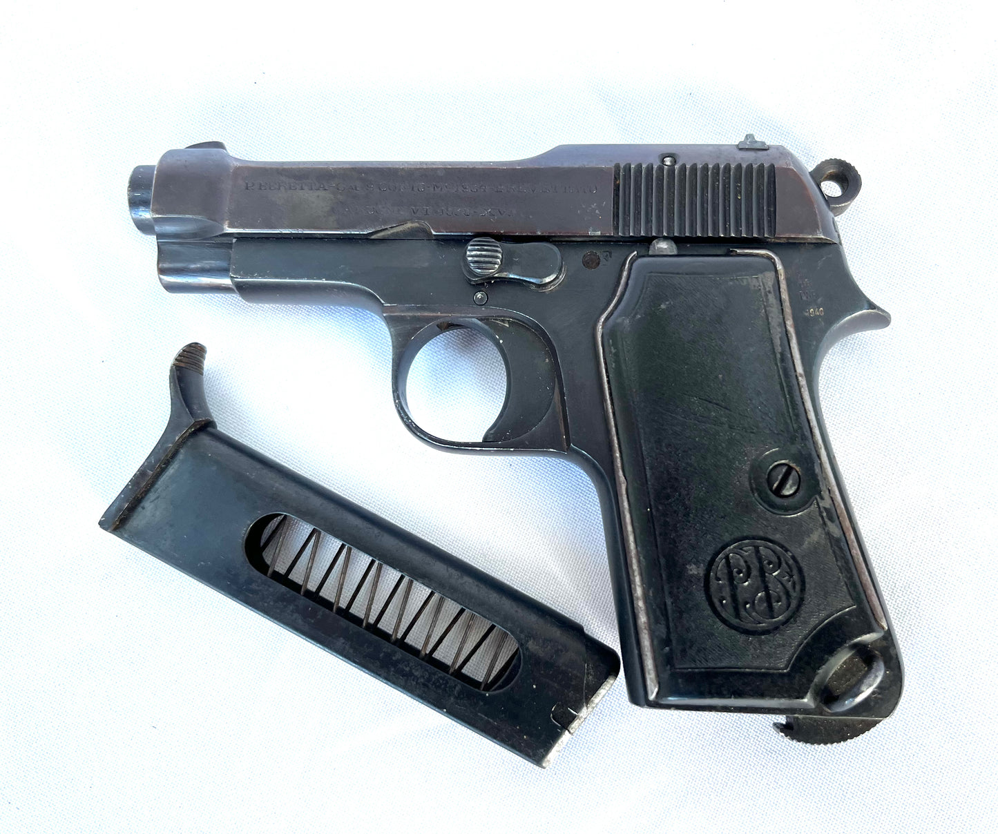 Deactivated Beretta M1934 with matching serial numbers dated 1940.