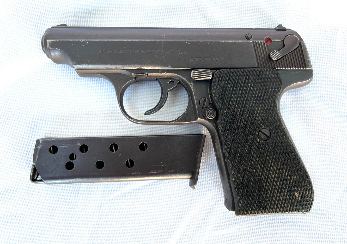 Deactivated WW2 Nazi Sauer 7.65 pistol. With Nazi eagle stamps.