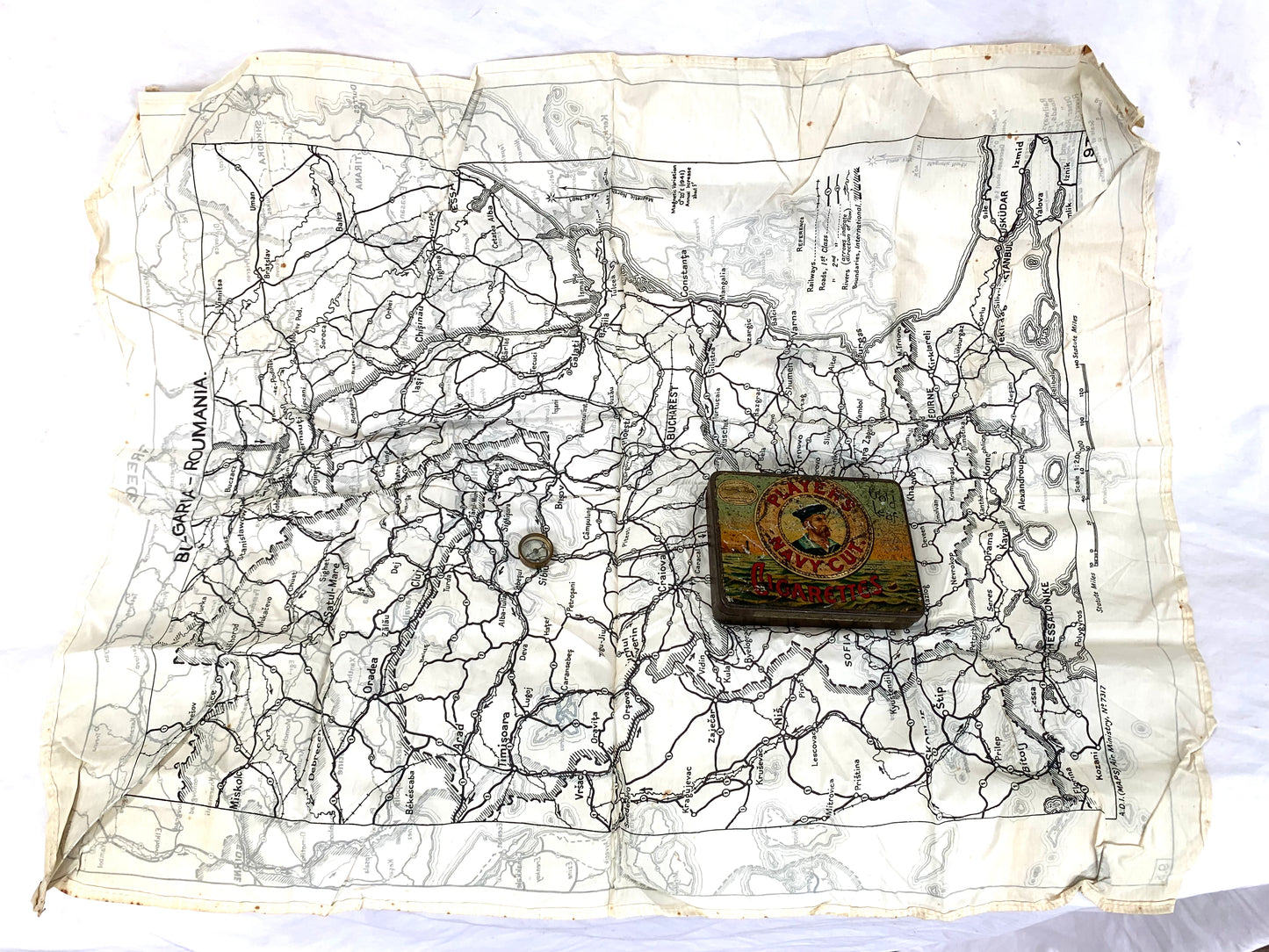 WW2 SOE and RAF Silk Escape Map of Greece, Bulgaria and Romania complete with Compass and Players Cigarette Tin.