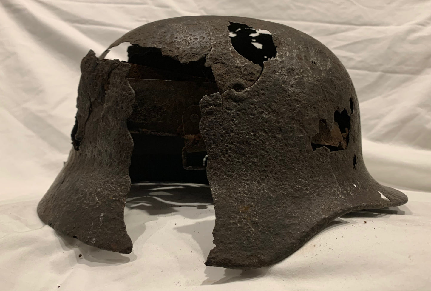 WW2 German M40 Battle Damaged Helmet from the Eastern Front.