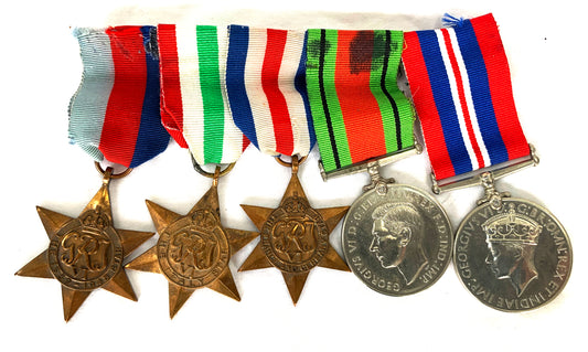 WW2 British Five Medal Group - 1939-1945 Star, The Italy Star, The France and Germany Star, The Defence Medal and The 1939-1945 Medal